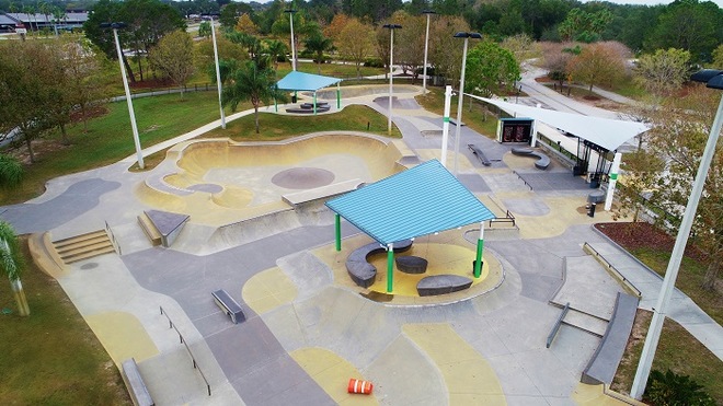 Skateboarders enjoying the diverse features of Fletcher Park in Lakeland, Florida